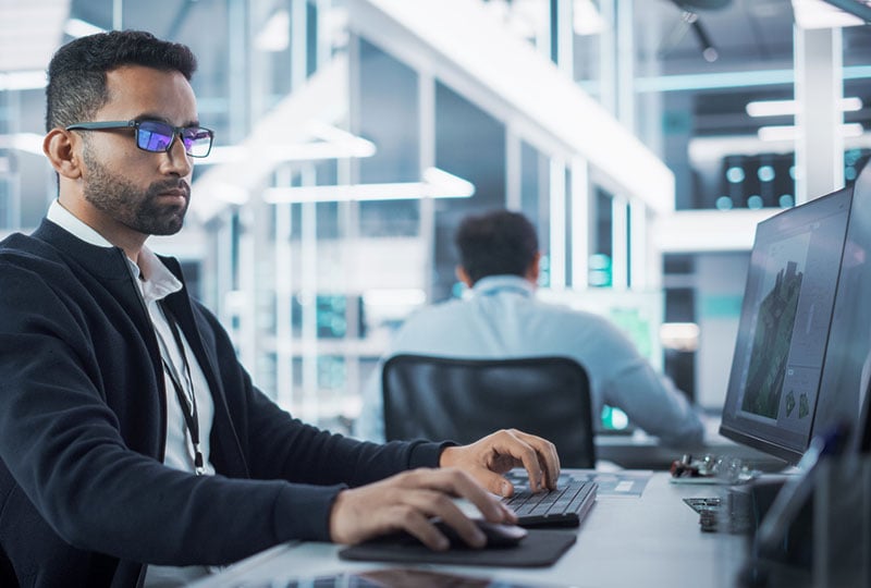 man working at his desk