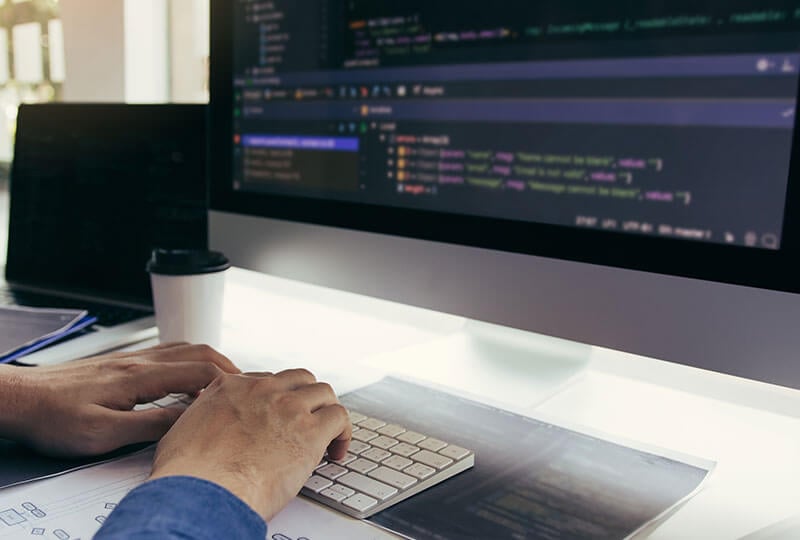 man inspecting code