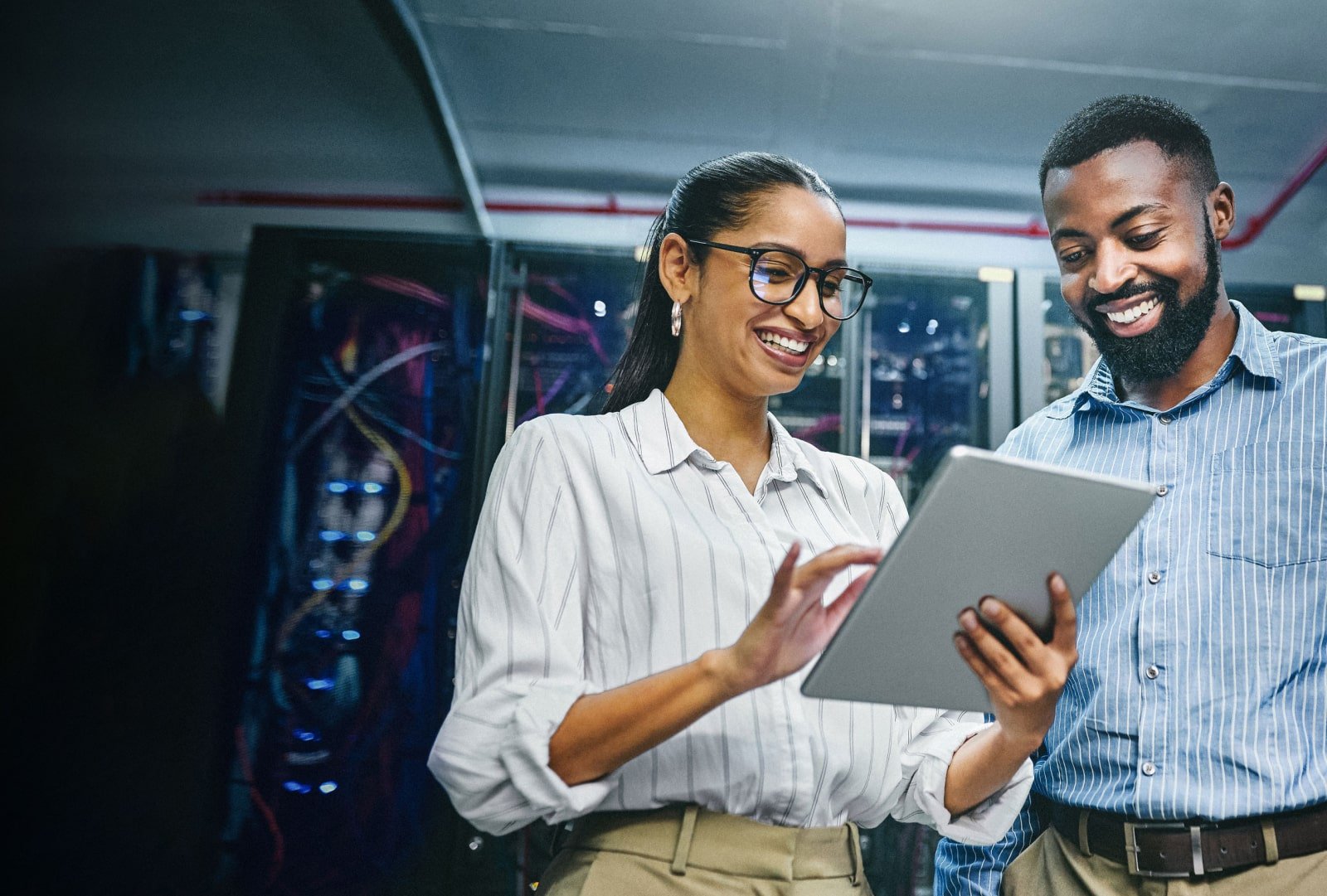 two people looking at a tablet