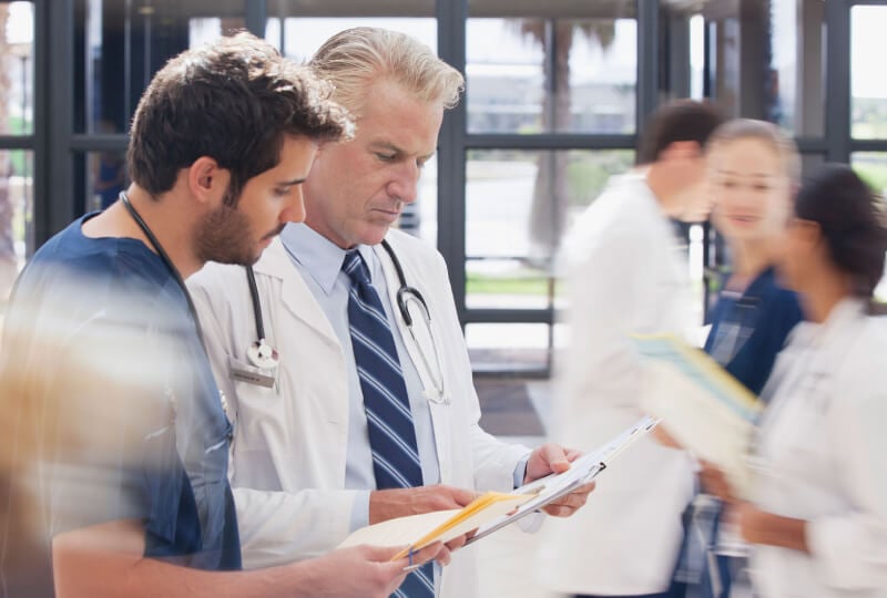 doctors in a busy room