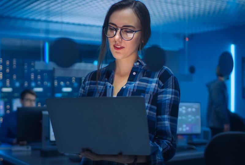 woman looking at a laptop