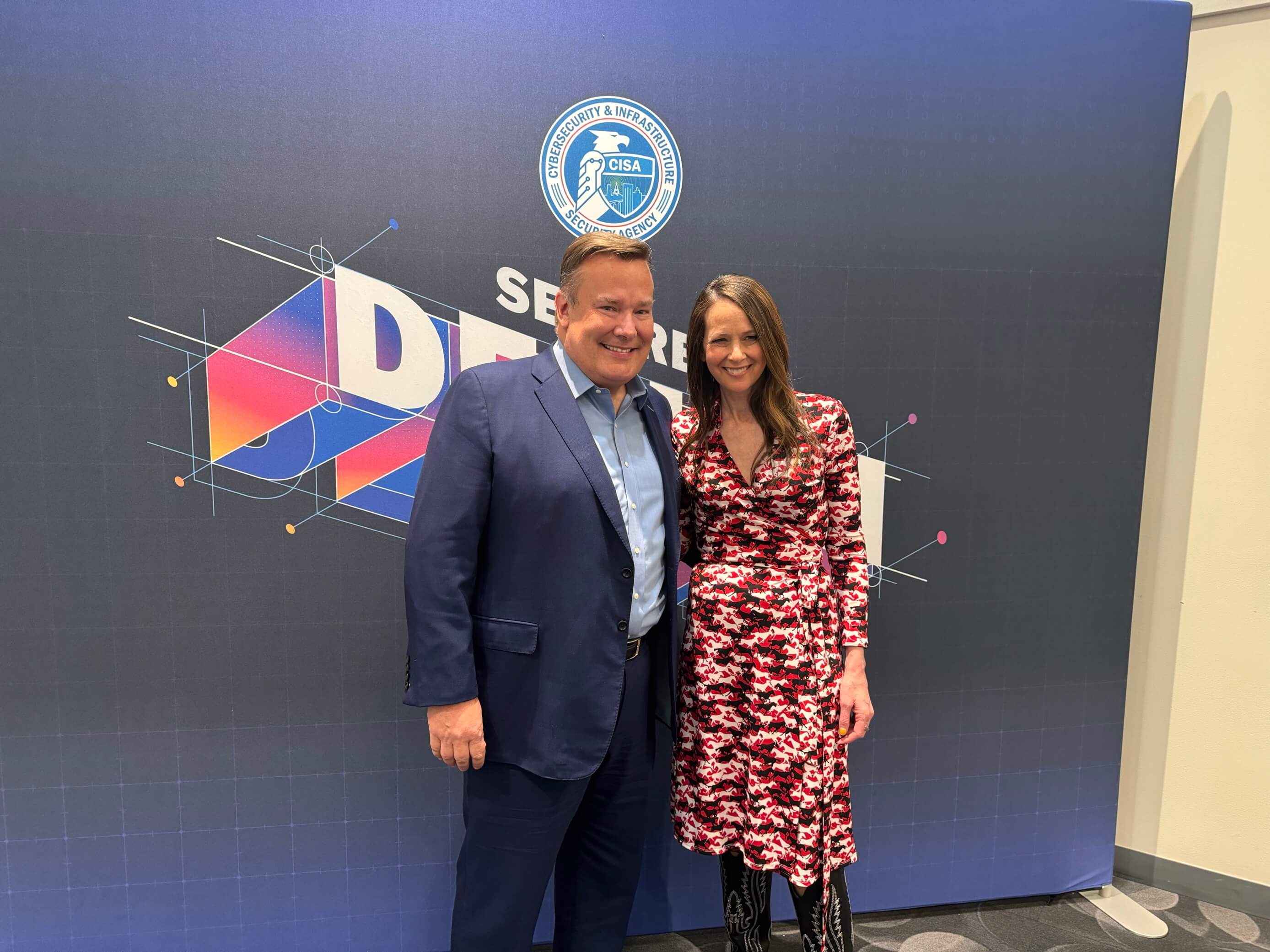 Jeff Abbott poses with Jen Easterly, head of CISA, at the Secure By Design Pledge signing at the RSA conference