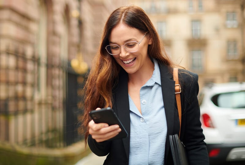 woman checking her mobile device