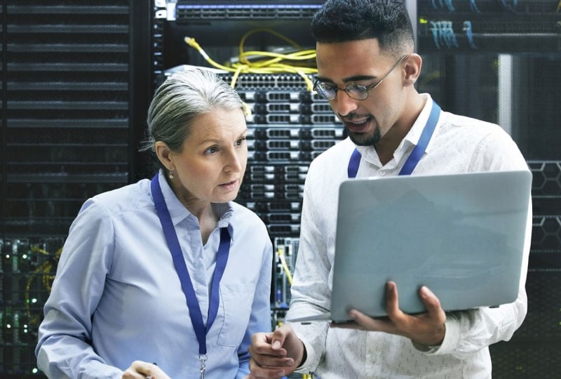 two coworkers in a server room