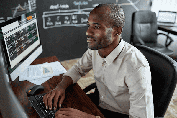 man working at his desk in an office